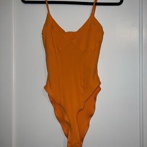 Orange Ribbed Body Suit